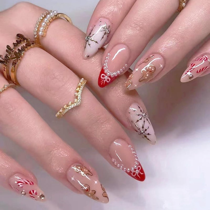 SEENEEY Christmas Almond Press on Nails Medium Fake Nails Red French Artificial Nail with Pearl and Gold Charm Designs Stick on Nail for Women 24pcs - Image 1